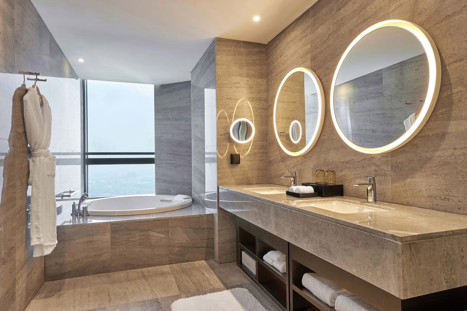 Separate tub and shower, rainfall showerhead, free toiletries