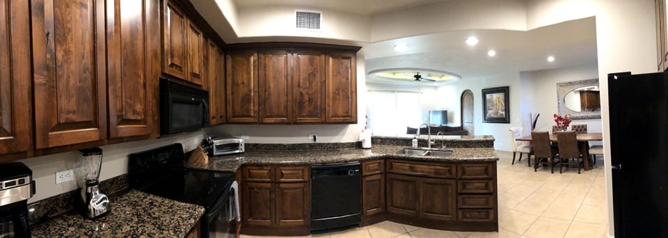 Fully-equipped kitchen with plenty of cabinet space for your groceries