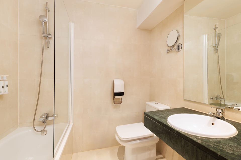 Eco-friendly toiletries, hair dryer, towels, soap