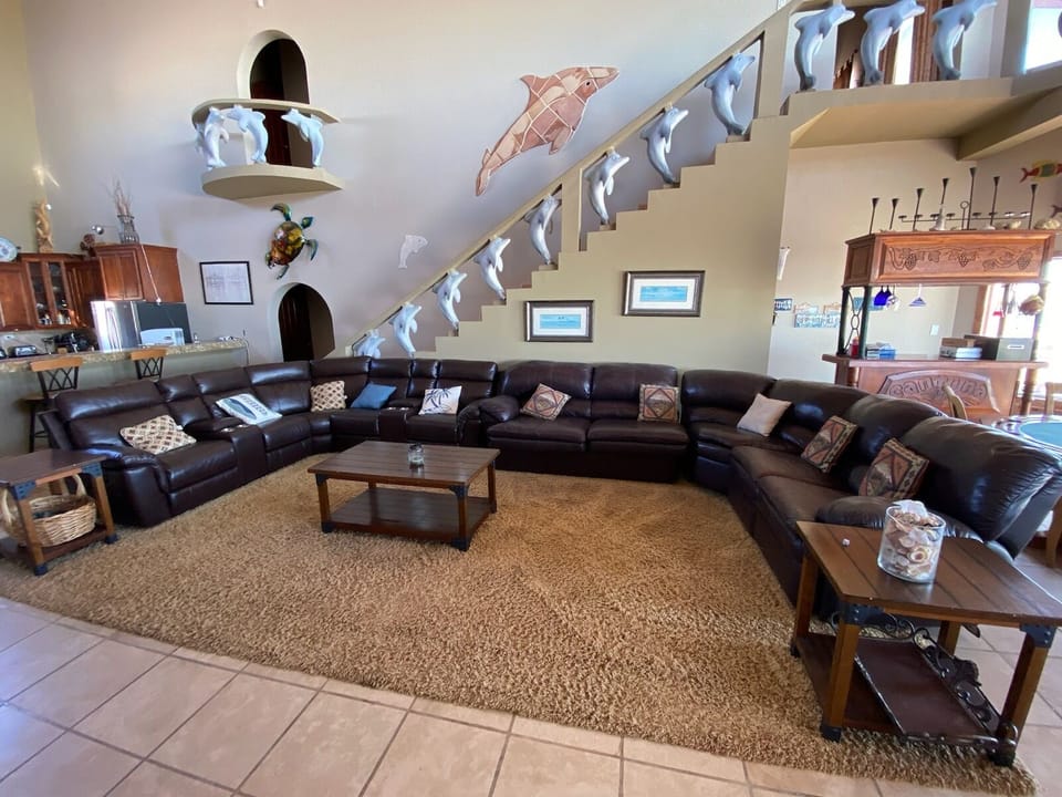 Very Large Sectional watching flat screen TV