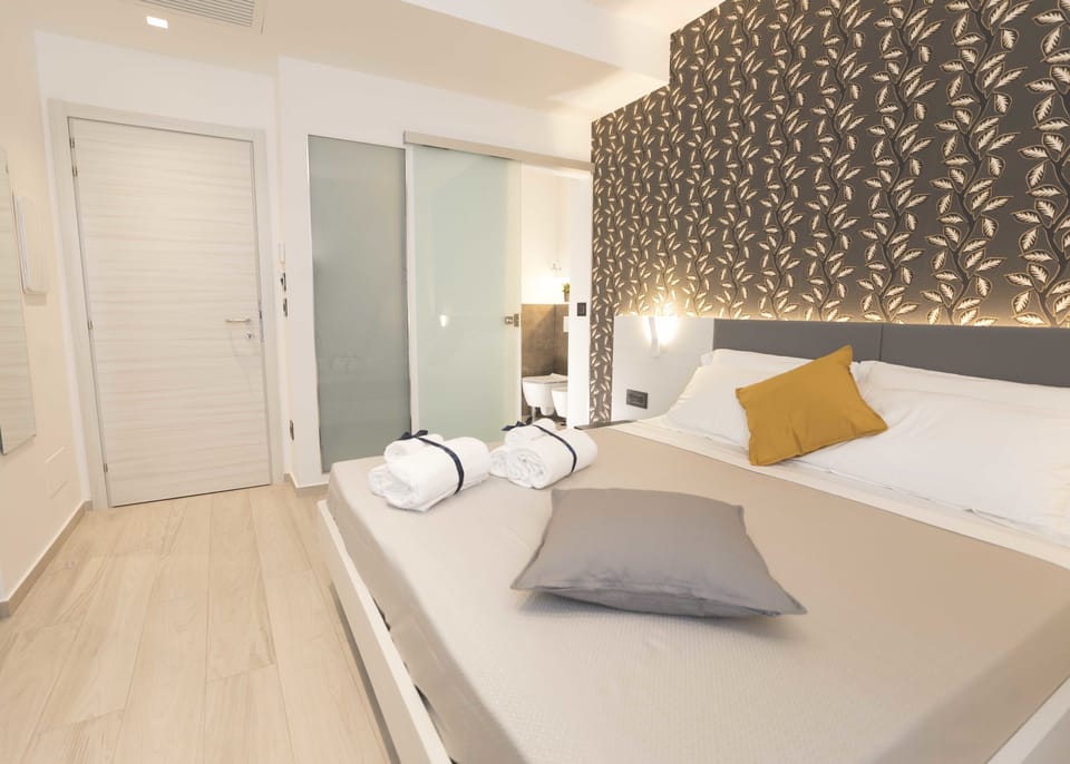 Premium bedding, down comforters, memory foam beds, minibar