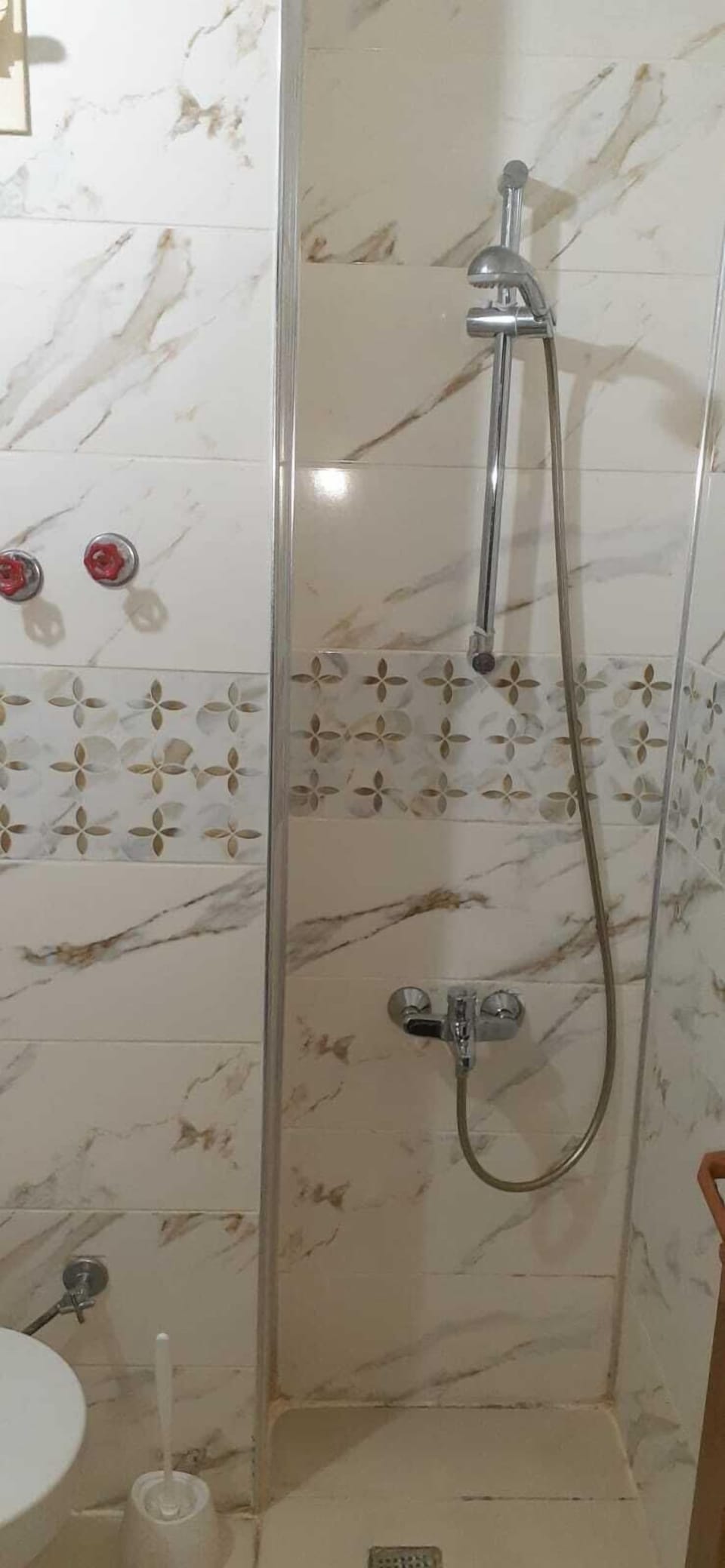 Shower, free toiletries, slippers, towels