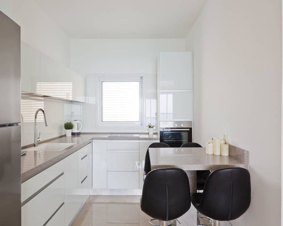 Design Apartment | Private kitchen | Full-size fridge, microwave, oven, stovetop