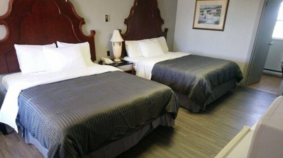 Down comforters, Select Comfort beds, individually furnished, desk