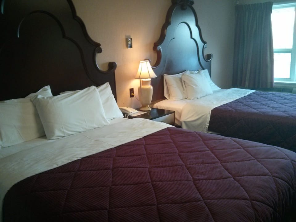 Down comforters, Select Comfort beds, individually furnished, desk