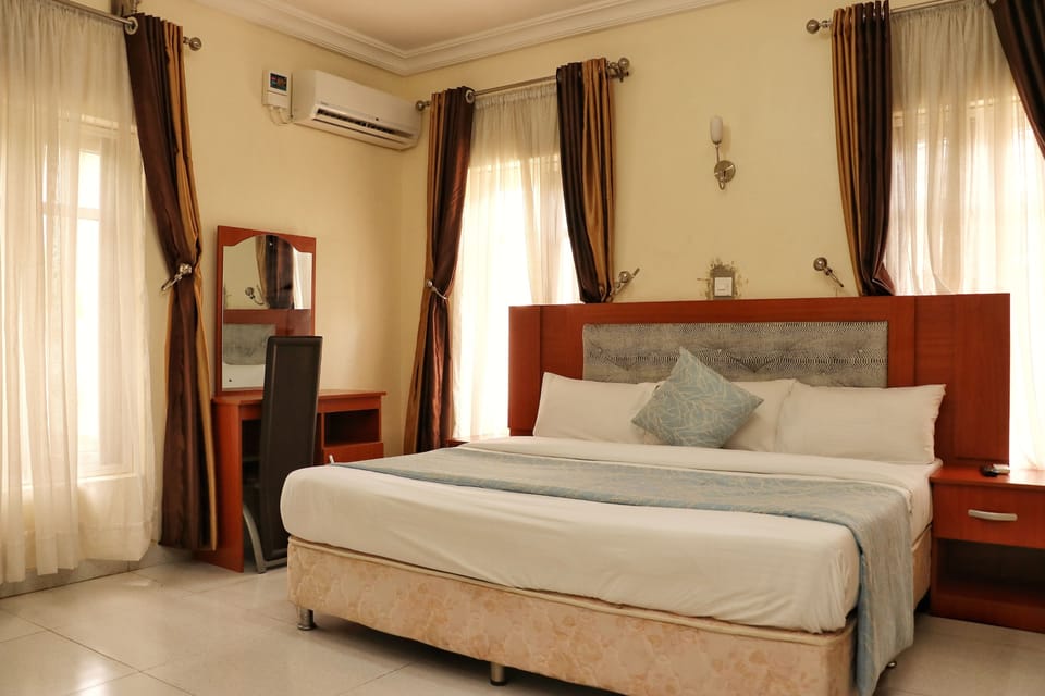 Family Apartment | Minibar, desk, laptop workspace, free WiFi
