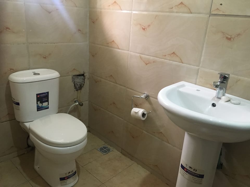 Shower, bathrobes, bidet, towels