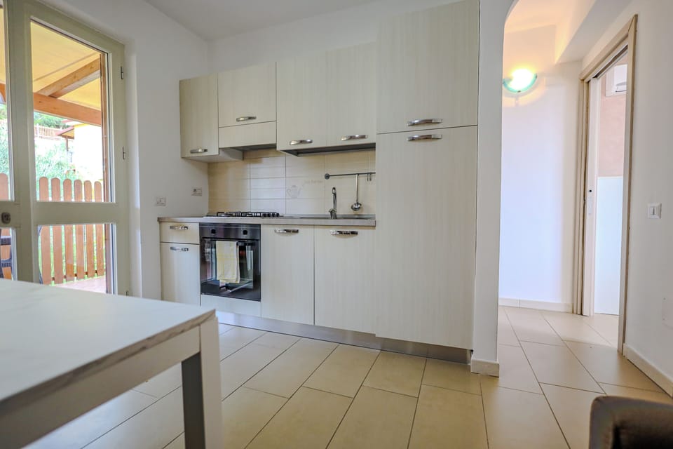 Apartment, 1 Bedroom, Terrace, Sea View | Private kitchen | Fridge, stovetop, cookware/dishes/utensils, dining tables