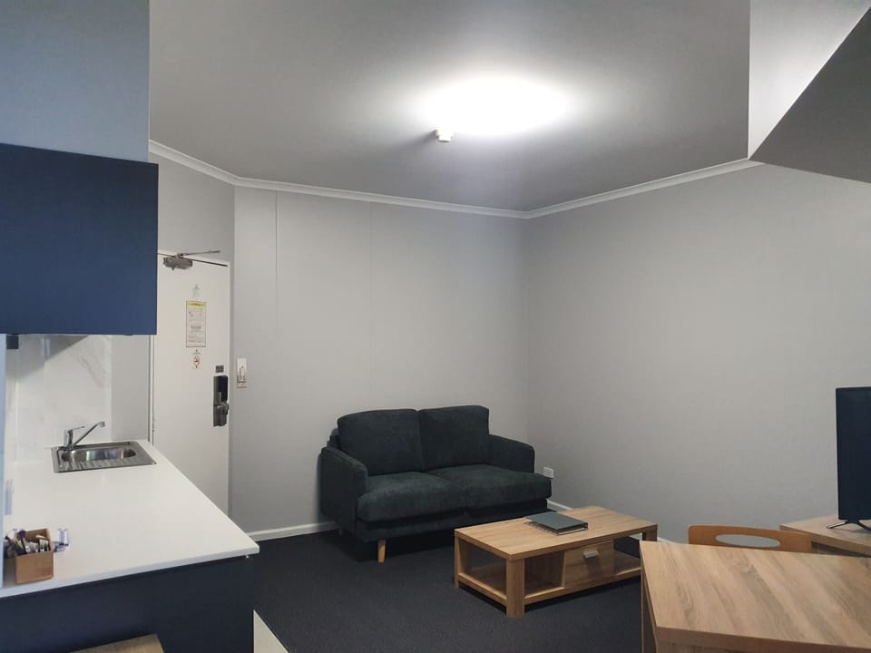 One Bedroom Apartment King Executive - KE | Living area | 26-inch LCD TV with digital channels, TV