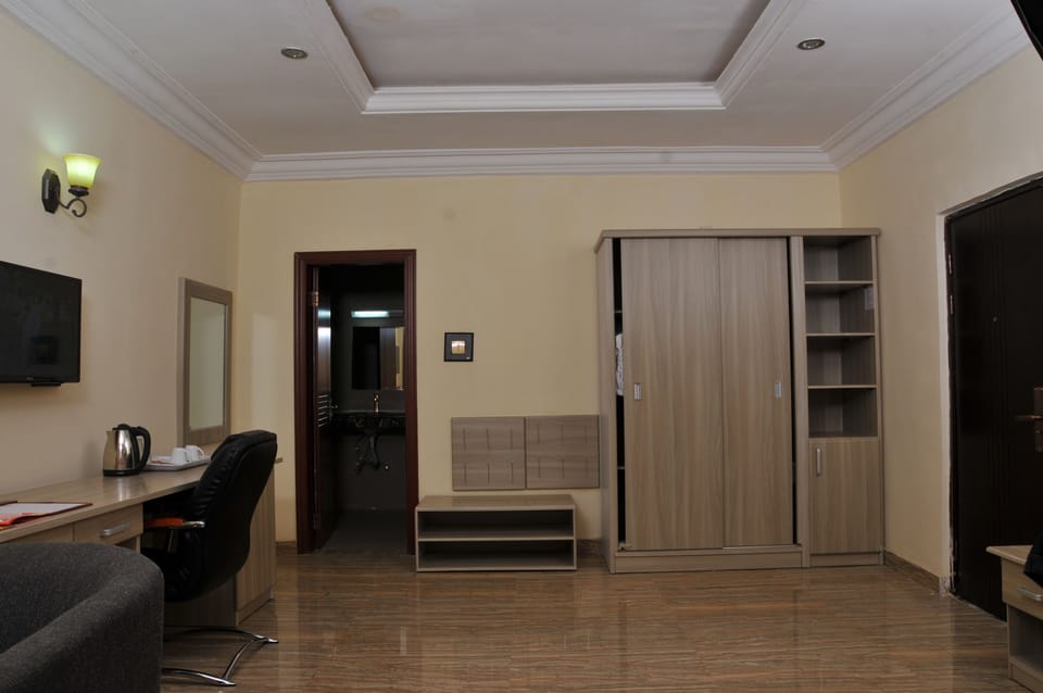Apartment, 2 Bedrooms | Living area | 32-inch LCD TV with satellite channels, TV