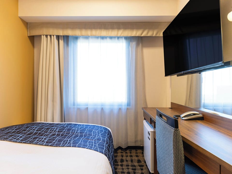 Desk, blackout drapes, iron/ironing board, free WiFi