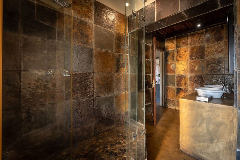 Deep soaking tub, rainfall showerhead, free toiletries, hair dryer
