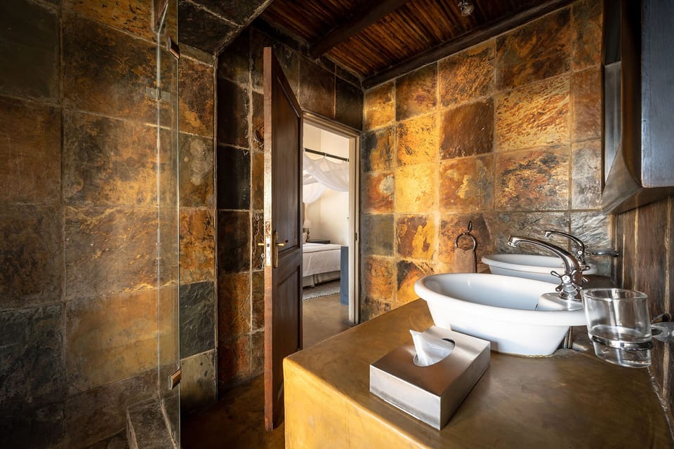 Deep soaking tub, rainfall showerhead, free toiletries, hair dryer