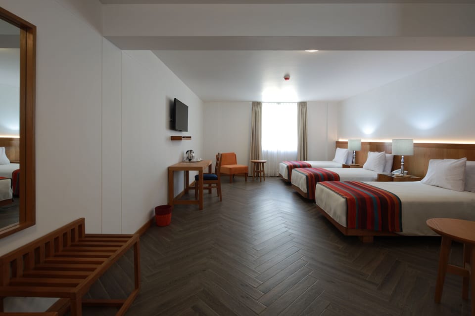 Standard Triple Room | In-room safe, desk, blackout drapes, soundproofing