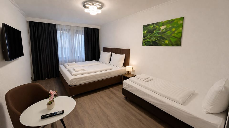 Triple Room | Premium bedding, pillowtop beds, in-room safe, desk