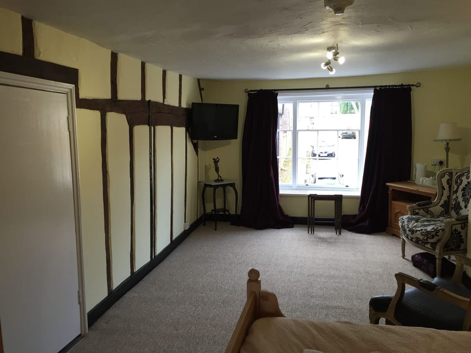 Family Room, Ensuite | Living area | 24-inch flat-screen TV with digital channels, TV