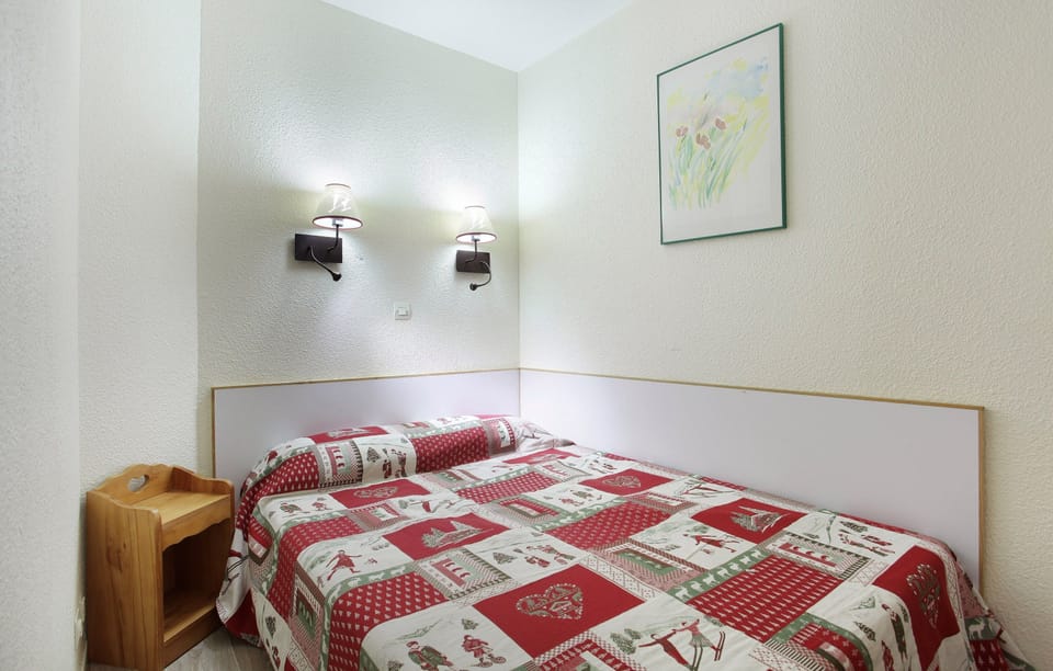 The master bedroom features a cozy Double bed.