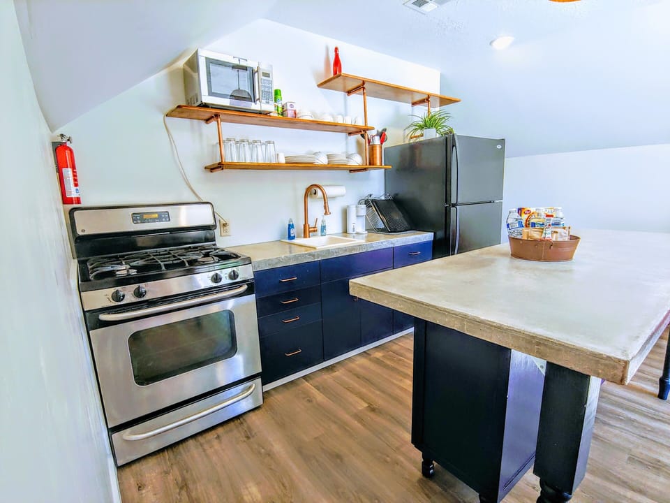 Fully stocked kitchen with full size appliances