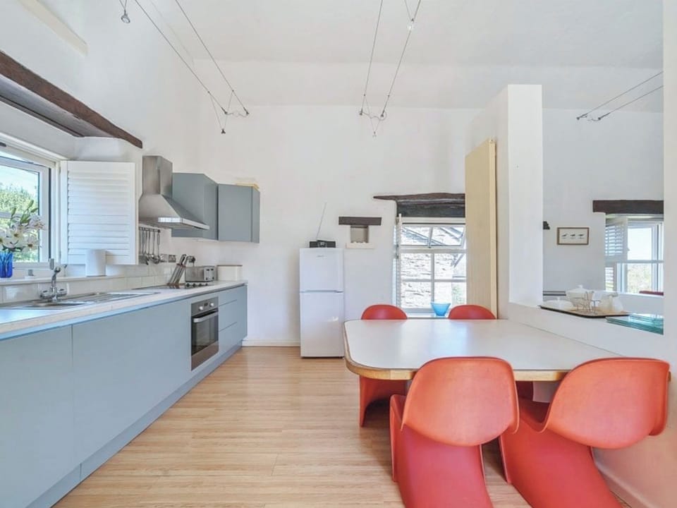Kitchen in open plan living space | Moderno - Tregrill Farm Cottages, Menheniot, near Liskeard
