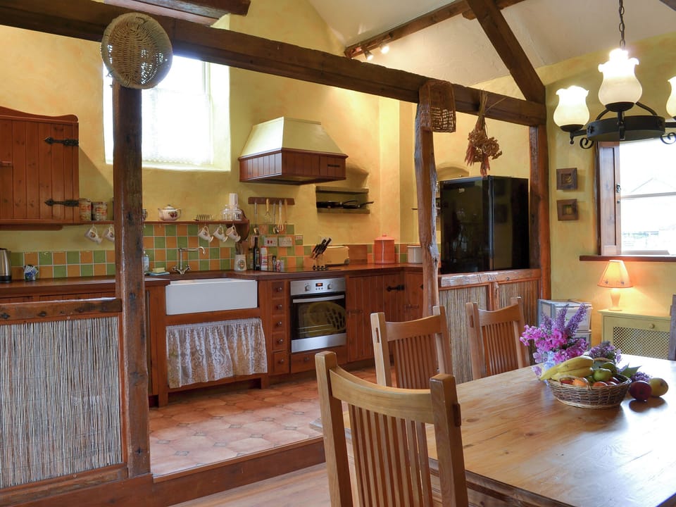 Kitchen with dining area | Provence - Tregrill Farm Cottages, Menheniot, near Liskeard