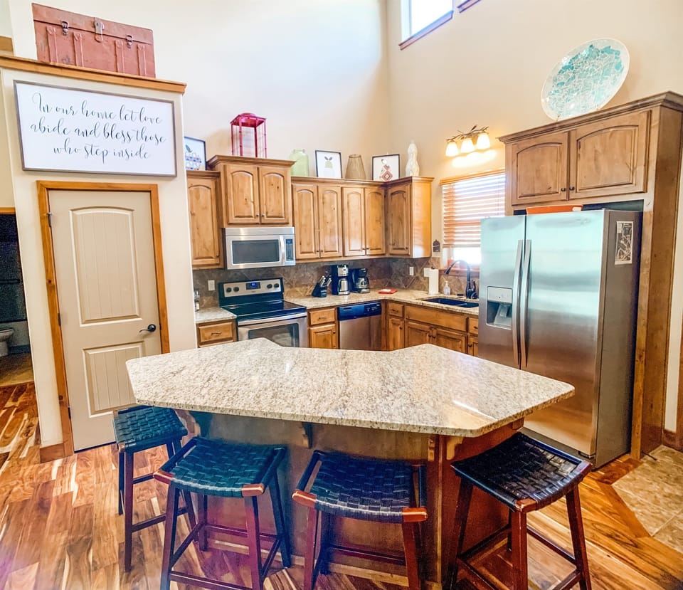 Fully stocked kitchen with island seating