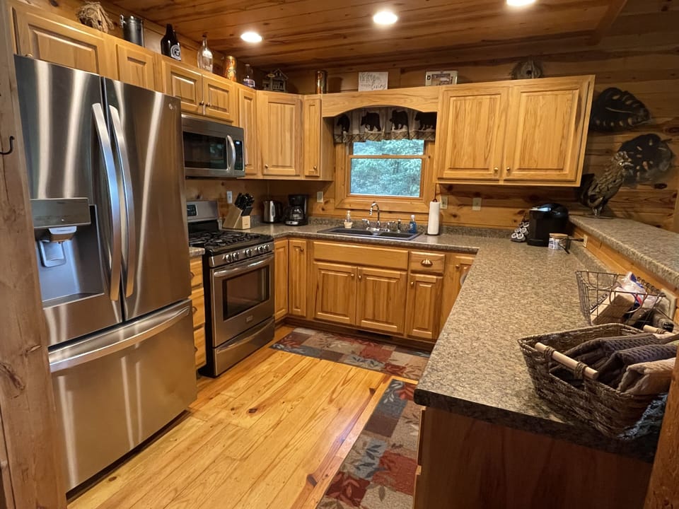 Spacious modern kitchen with gas stove and dishwasher