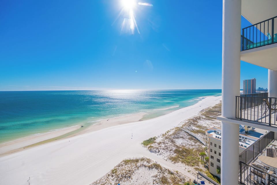 Enjoy breathtaking coastal views from your balcony while basking in the warmth of the sun and gentle beach vibe