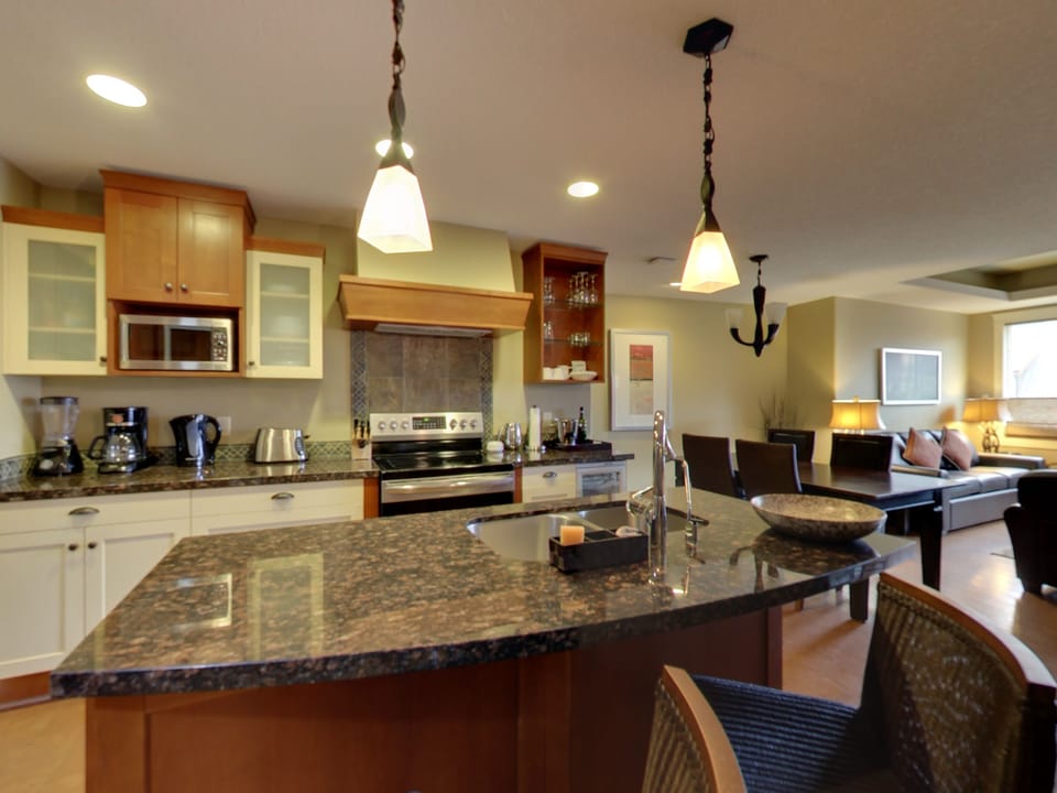 Fully Stocked Kitchen. Gorgeous granite, Stnls. Appliances, & Wine Fridge. 
