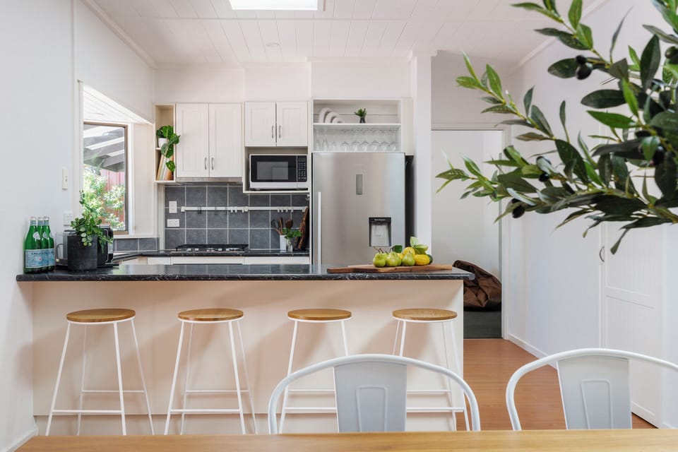 Kitchen with stove, oven, microwave, Nespresso coffee machine, sandwich press and more