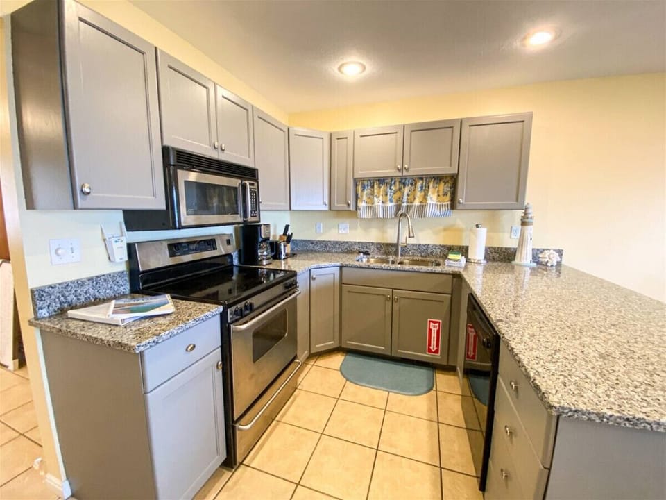 Stylish kitchen with ample counter space and updated finishes
