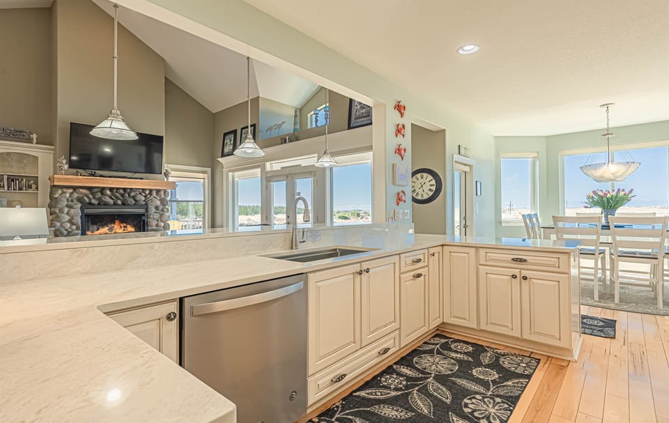 Kitchen looks out into the living room.