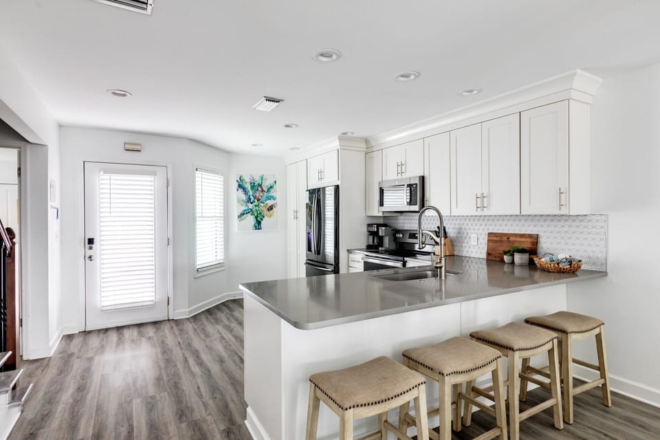 The kitchen overlooks the dining area and living room, great for entertaining!