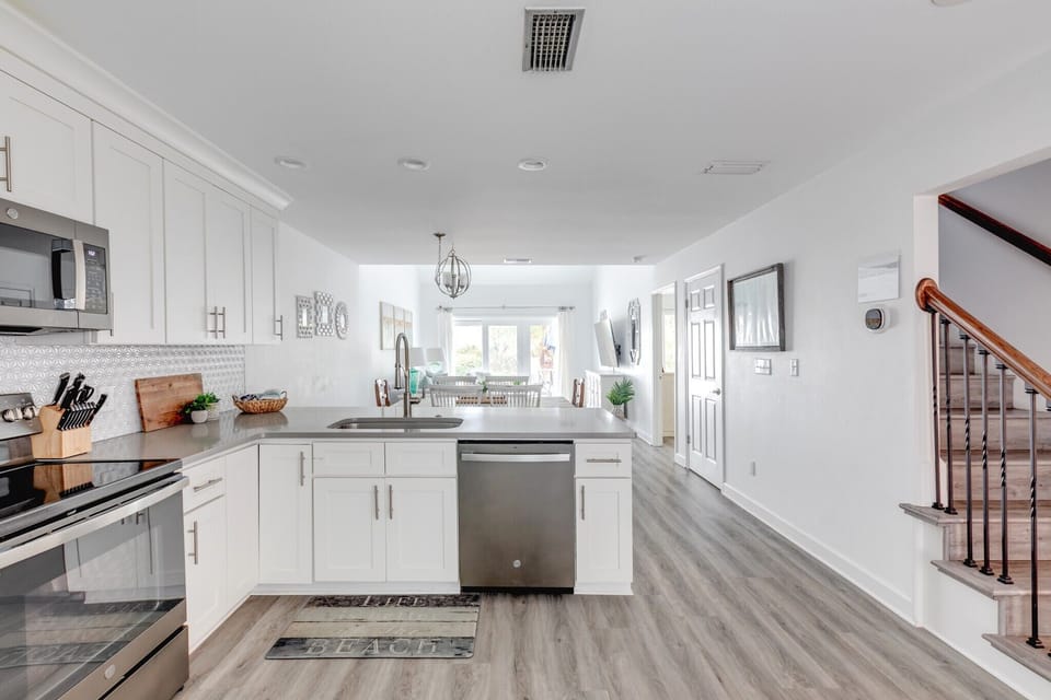 The kitchen overlooks the dining area and living room, great for entertaining!