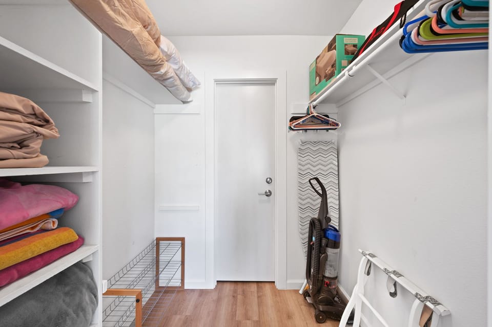 White bedroom has a walk in closet!
