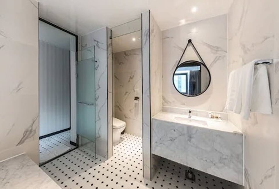 Standard Double Room, City View | Bathroom | Combined shower/tub, free toiletries, hair dryer, bathrobes