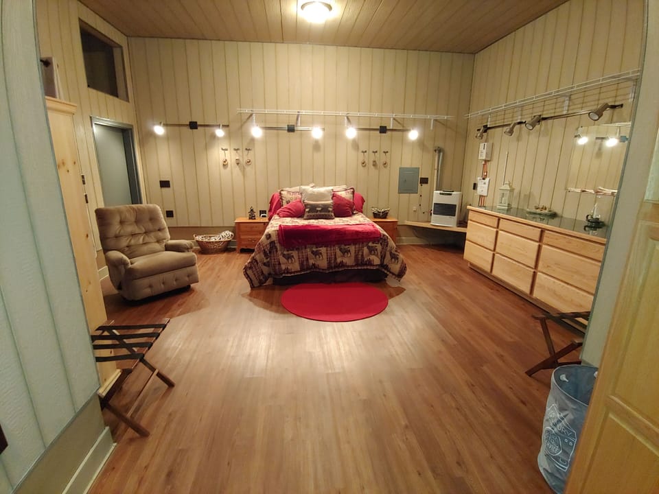Enjoy our spacious main bedroom with queen size bed.