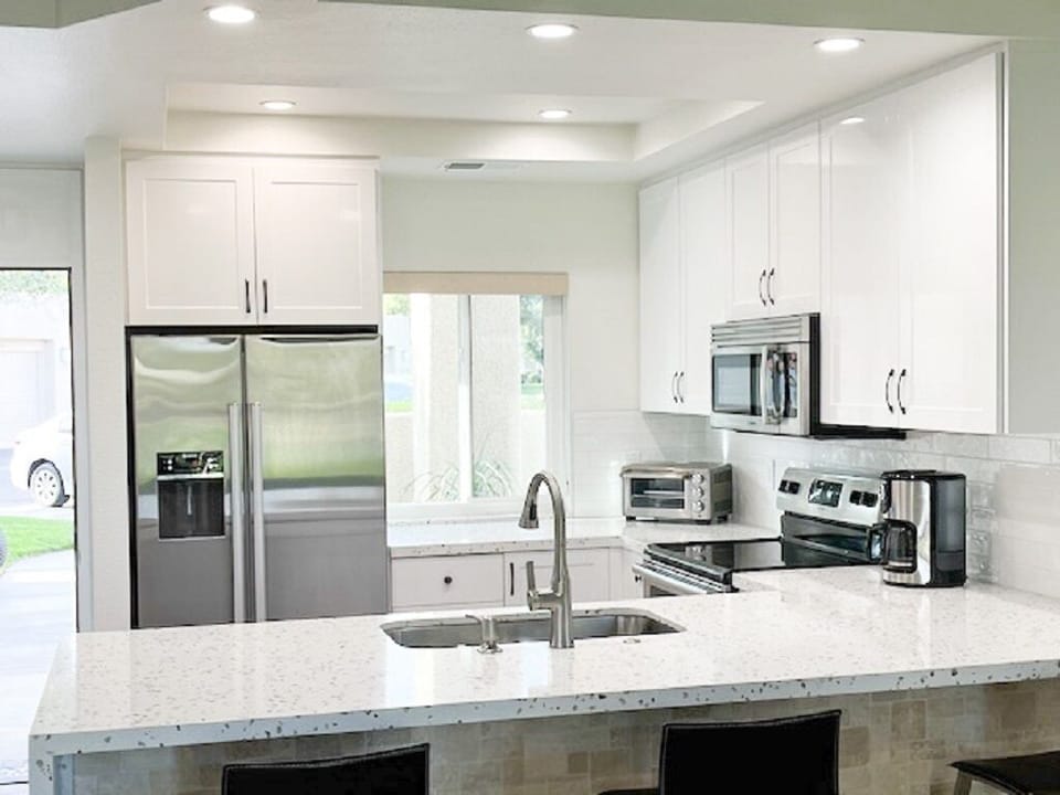 Ample cooking space with high end appliances.