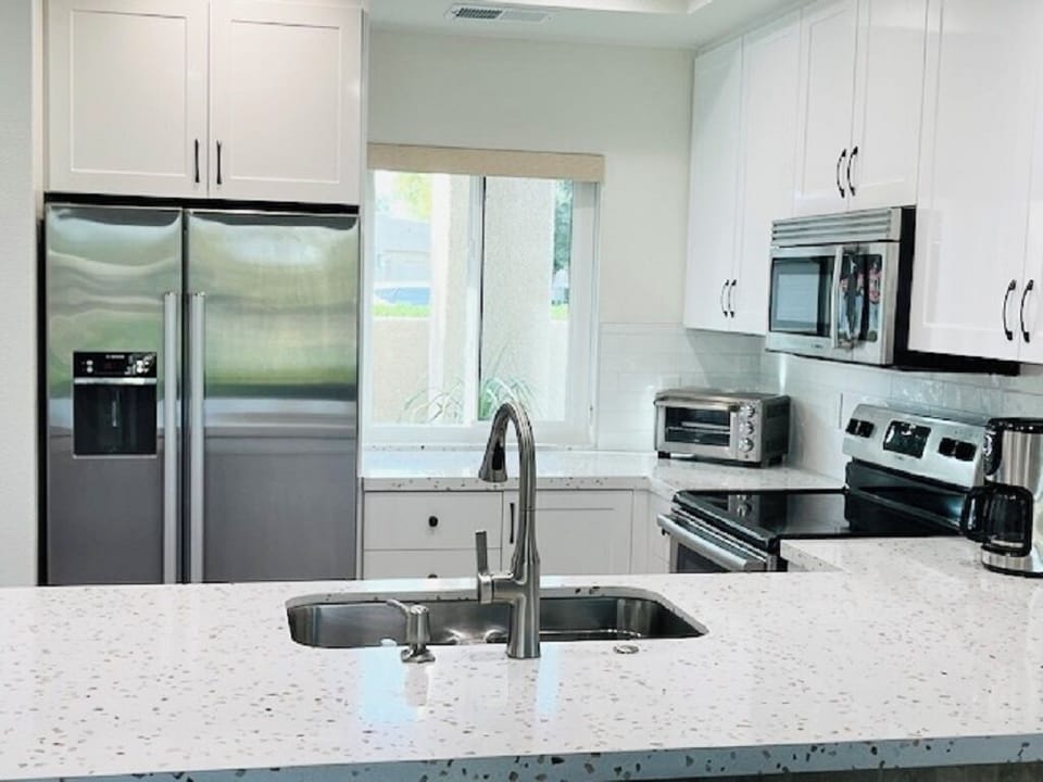 A kitchen fully stocked for all your cooking needs.
