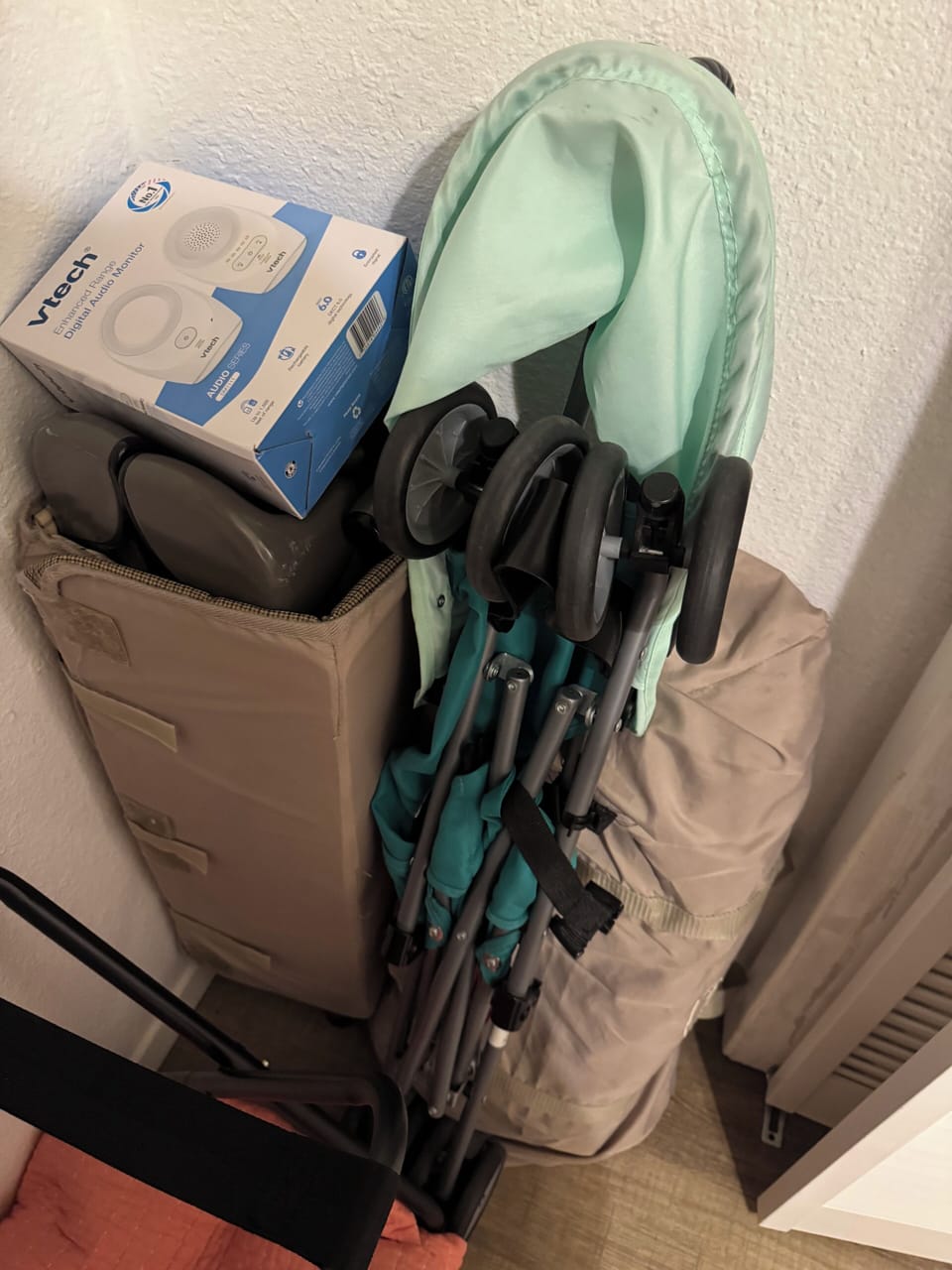 Pack-n-play, banana stroller and baby monitor in the downstairs closet.