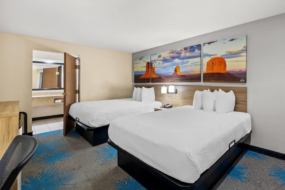 Standard Room, 2 Queen Beds | Blackout drapes, free cribs/infant beds, rollaway beds, free WiFi