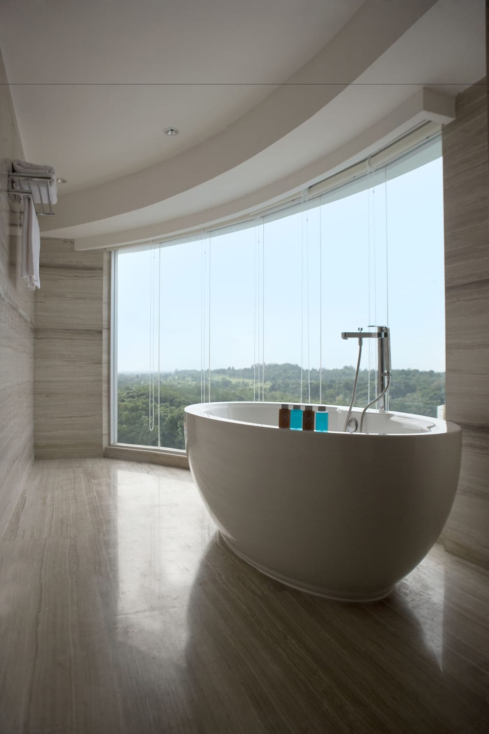 Eco-friendly toiletries, hair dryer, slippers, towels