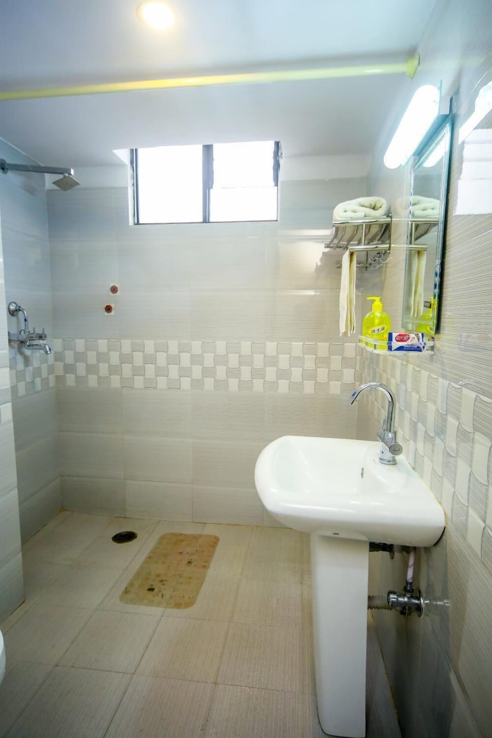 Shower, free toiletries, slippers, towels