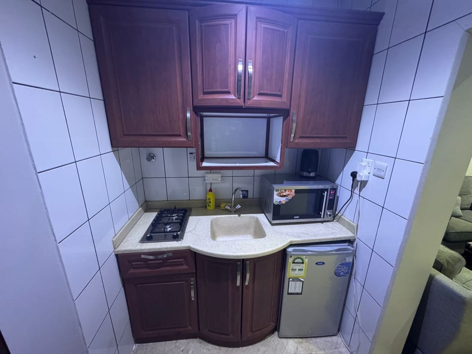 Standard Suite | Private kitchen | Fridge, microwave, stovetop, electric kettle