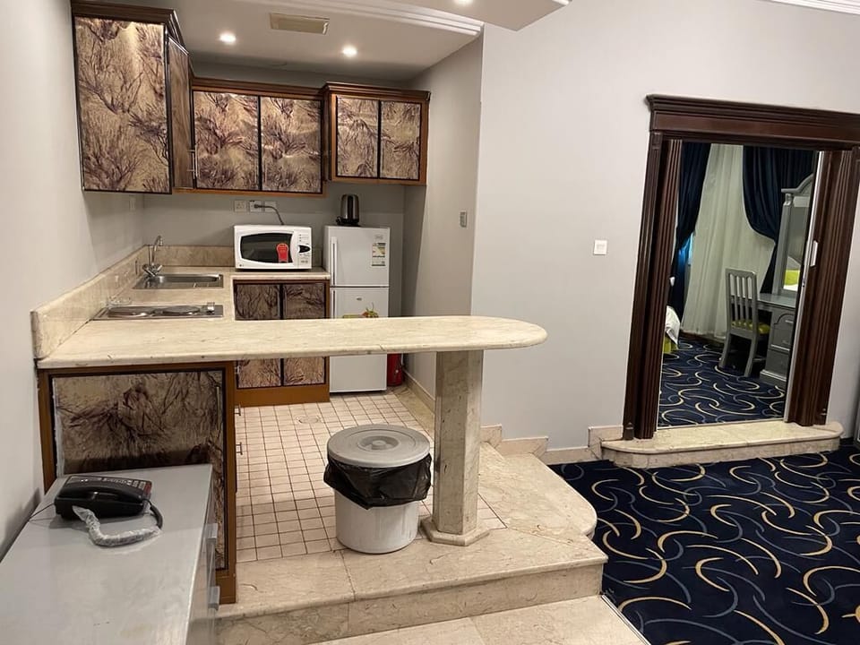Standard Suite | Private kitchen | Fridge, microwave, stovetop, electric kettle