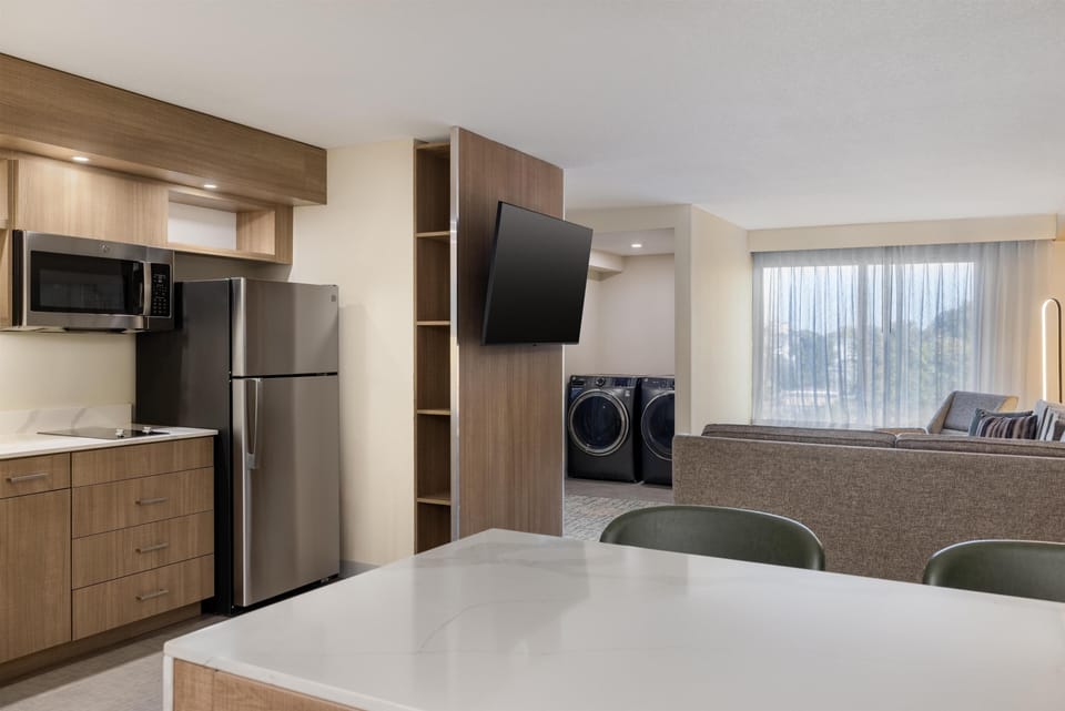 Suite, 1 Bedroom | Private kitchen | Fridge, microwave, stovetop, dishwasher