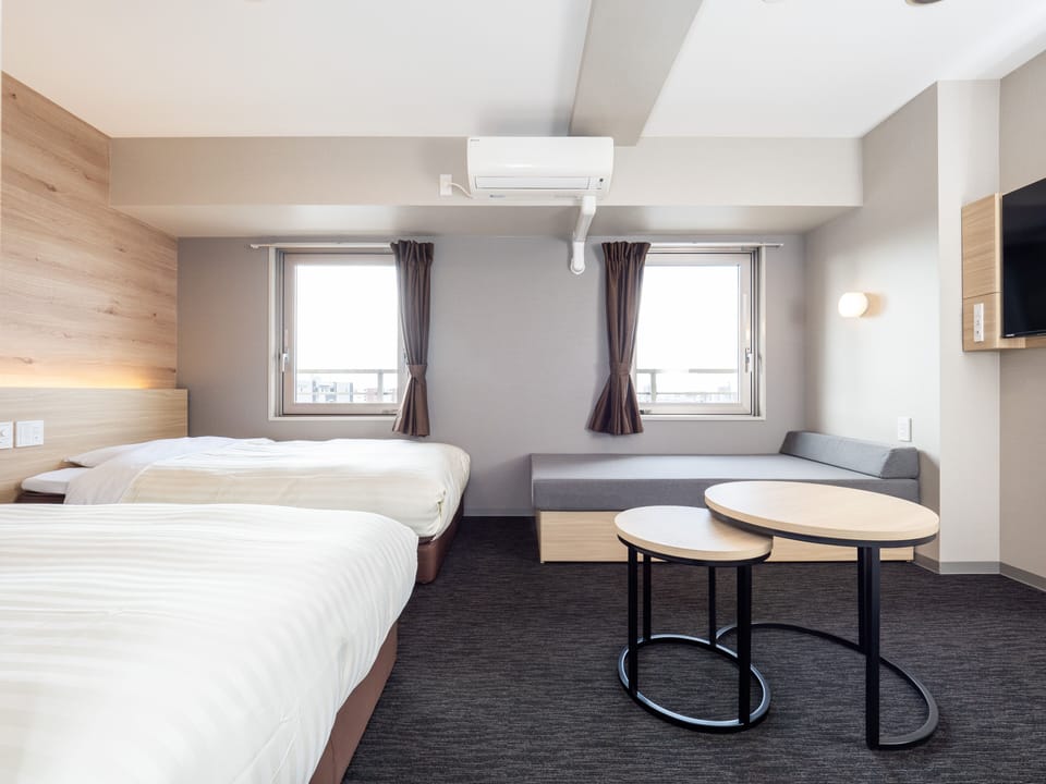 Twin Room, Non Smoking (A type) | Desk, blackout drapes, soundproofing, iron/ironing board