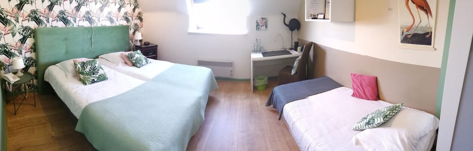Triple Room | Down comforters, minibar, individually decorated, desk