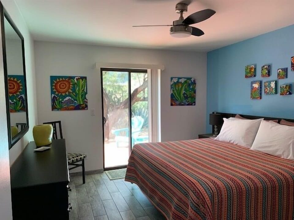 Second bedroom contains sliding glass door leading to backyard.