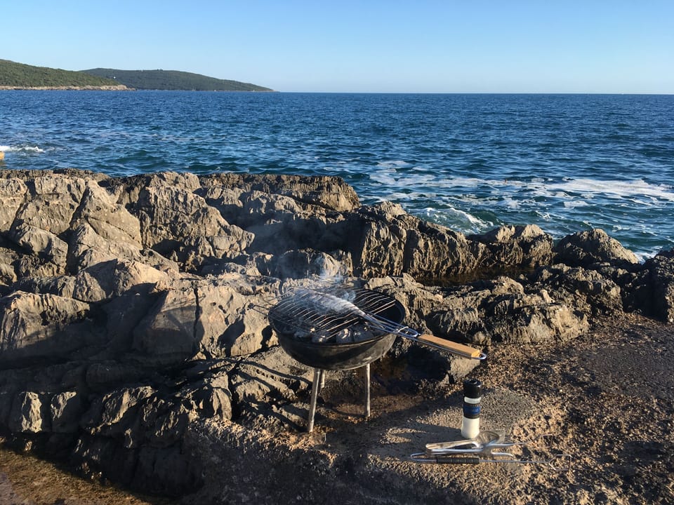 BBQ on the rocks on the left of Plavi Horizonti beach