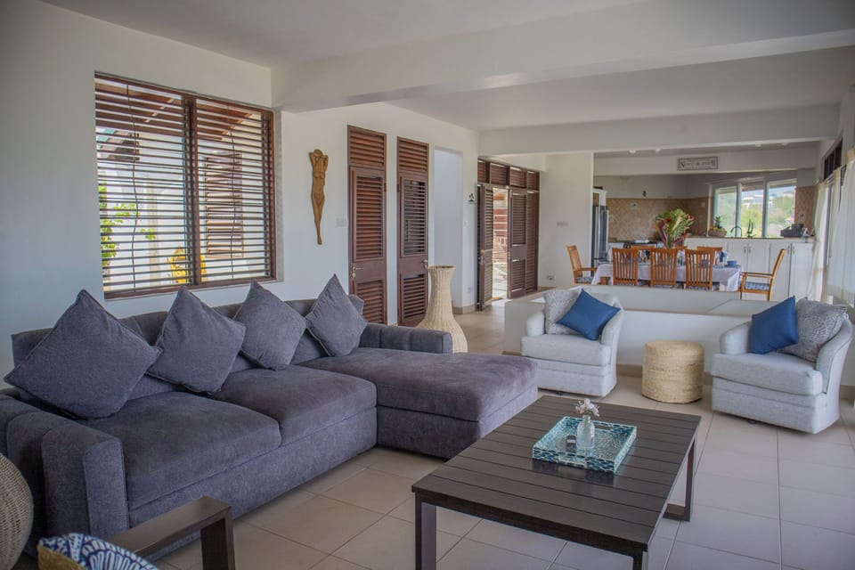 Large open plan living & dining room which opens up to a large patio with gorgeous views and cooling breezes.